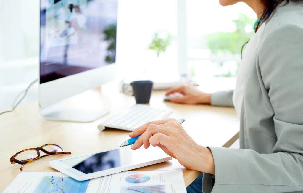 person analyzing data on a computer